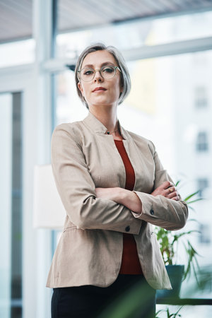 Making waves in the world of business. Cropped portrait of an attractive mature businesswoman...