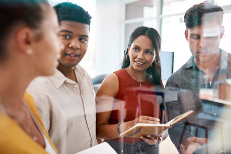 They each have such brilliant ideas to share. a group of businesspeople brainstorming together in an...
