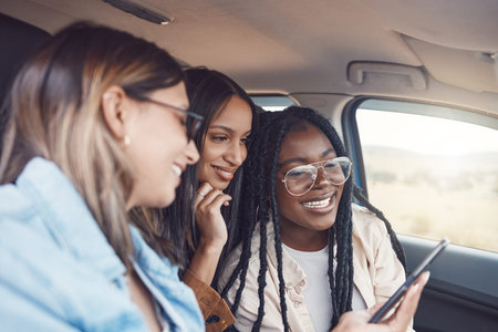 Travel, phone and friends with women in car for directions, adventure and journey. Gps, map and...