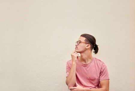 Man, thinking or glasses on isolated background for fashion promotion branding, optometry sales deal or mockup marketing space. Model, student or optician vision ideas for healthcare wellness or eyesの写真素材