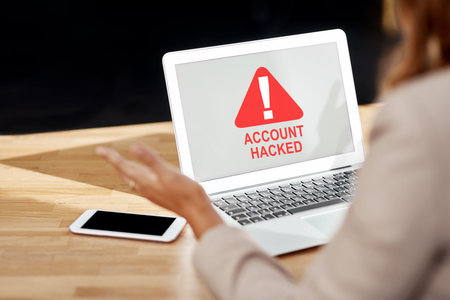 Hackers can strike you at anytime. an unrecognizable businesswoman working on a laptop in her...