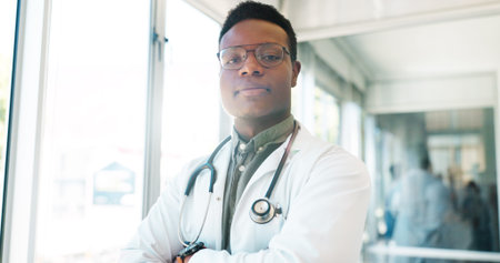 Black man, face or doctor arms crossed in hospital with surgery ideas, life insurance vision or...