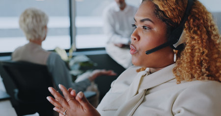 Call center woman, communication and explain for customer service, help and advice in office for career. Black woman, crm expert or consultant for contact us, customer support and consulting clientsの写真素材