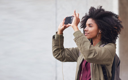 Black woman, phone photography and travel in the city for tourism or sightseeing in the outdoors....