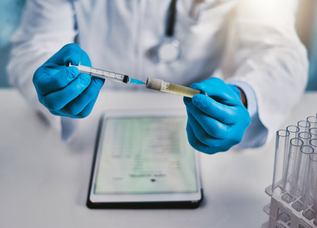 This could be the one. an unrecognizable male scientist working in a lab.の写真素材