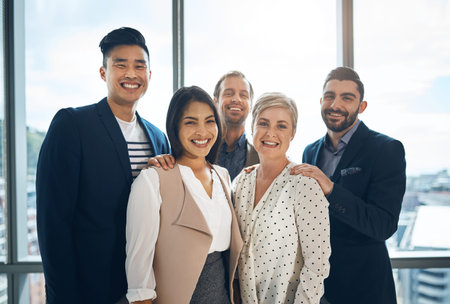 They have been taking the company forward for a while. Portrait of a group of confident young...