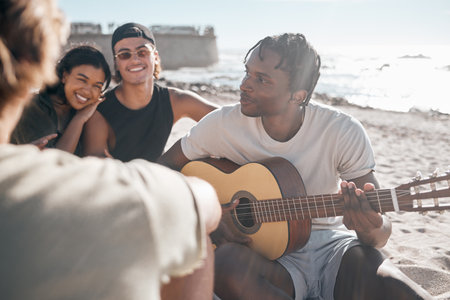Black man, friends or playing guitar by beach, ocean or sea in holiday vacation, summer travel or social gathering. Smile, happy or couple of friends with musical instrument in relax diversity picnicの写真素材