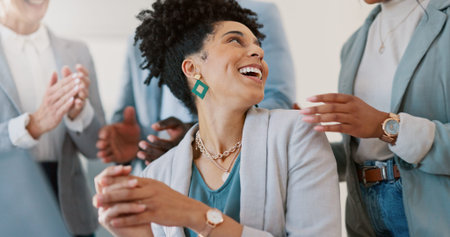 Applause, celebration and business woman with good news, achievement or job promotion in the office....