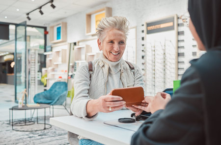 Eye care, senior woman and glasses for patient shopping for vision lens or frame at optics store....
