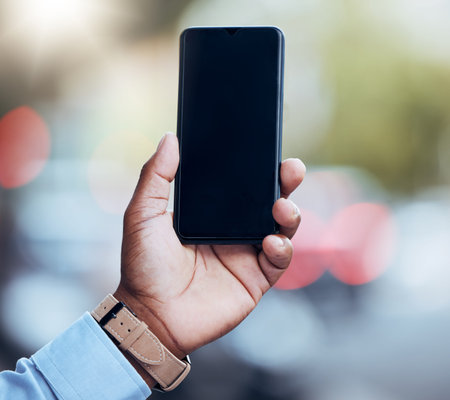 Man, hands and mockup phone in city for data management, gps app and business news online. Urban...