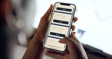 Job search, smartphone screen and hands on recruitment website, we are hiring or hr software on mobile app. Ux design, Human Resources marketing or advertising for career SEO search engine technologyの写真素材