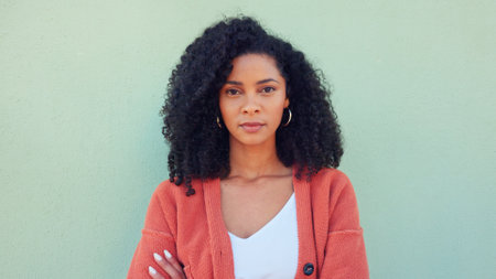 City green wall, hair care face and woman on travel holiday, smile for urban town and comic joke on the weekend on vacation. Portrait of beautiful, trendy and happy African girl in happiness downtownの写真素材