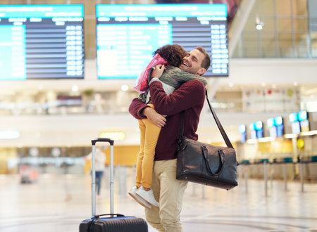 Family, father and child hug at airport, travel and girl greeting man after flight, happiness and love with luggage at terminal. Happy, care and bond with trip, bag and welcome home with reunionの写真素材