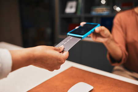 Closeup, hands and credit card for cashless payment, discount and ecommerce with client in store....