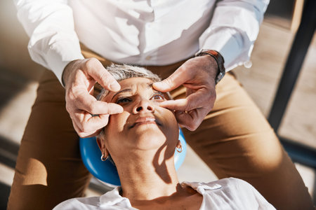Hands, face or senior woman in eye exam for eyesight at optometrist for an assessment in office....