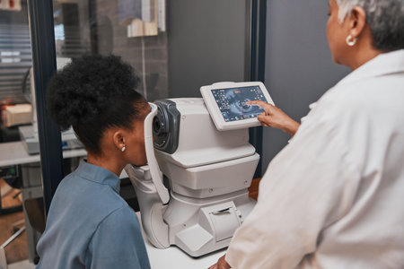 Digital eye test, vision and health for eyes, optometry and doctor with patient, eyecare and...