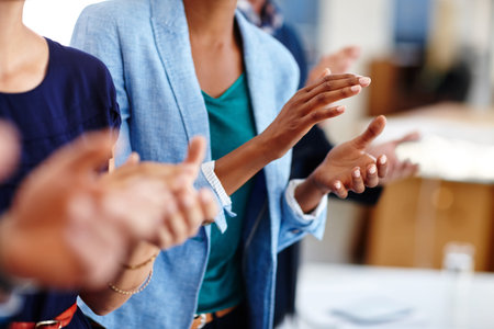 Showing their appreciation for an inspiring presentation. business professionals applauding a...