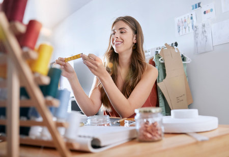 Designer woman, measure and tape in workshop, small business or factory with happiness at job....