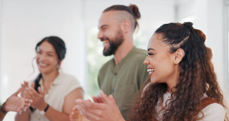 Winner, applause and success with a business team clapping together in their office for motivation....