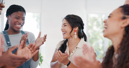 Winner, applause and success with a business team clapping together in their office for motivation....