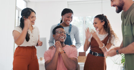 Winner, applause or happy black man with success in celebration of digital marketing sales goals or deal. Target, wow or excited worker smiles with pride to celebrate winning online at office deskの写真素材