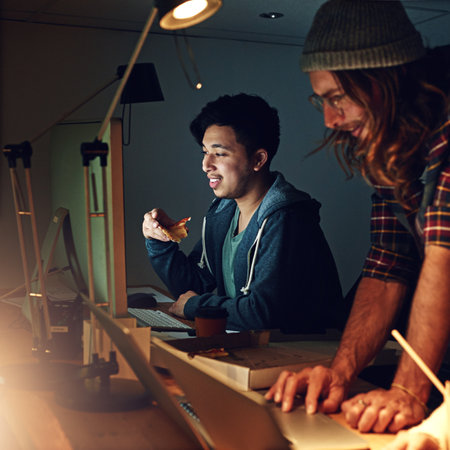 Coworking office, computer or night students working on web search for university research, digital IT database or project. Education learning, school study or diversity people review online softwareの写真素材