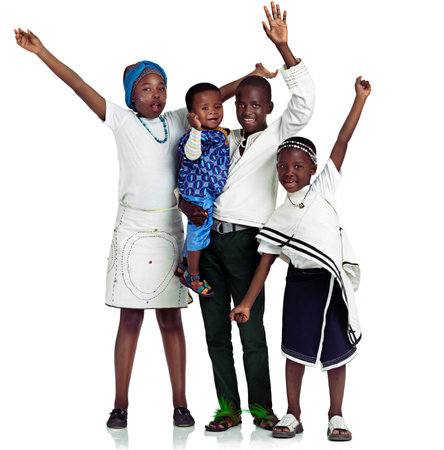 No sibling rivalry here. African siblings against white background.の写真素材