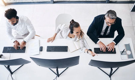 Above call center, team and office with crm, consultant and teamwork at desk, computer and help....