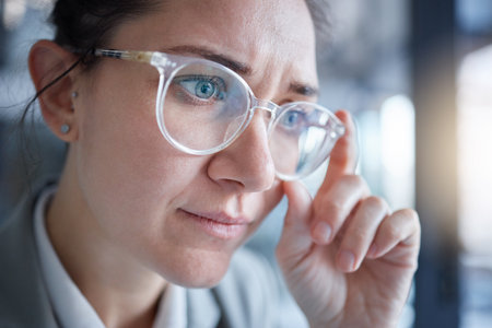 Business woman confused, vision and glasses, face and focus, prescription lens fail and problem. Optometry, health for eyes and adjust spectacles, eye care and reading, thinking and serious femaleの写真素材