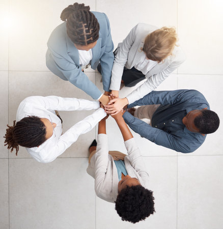 Hands stack, business people and team building of company mission, startup collaboration and group goals. Employee engagement, together hand sign and diversity circle in solidarity and teamwork aboveの写真素材