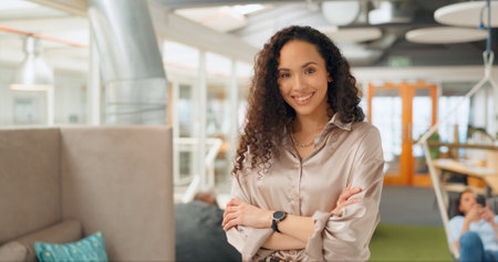 Creative business, leadership and portrait of black woman with crossed arms for vision, goals and mission. Success, marketing startup and face of happy female entrepreneur with smile, pride and ideasの写真素材
