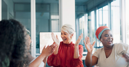 Business people, applause and winner, high five and support, team solidarity and celebrate meeting success. Professional win, trust and corporate, happy employee group and collaboration with winningの写真素材