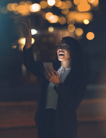 Phone, night stars and black woman outdoor checking galaxy and solar system on app. Happy, smile and young person in city pointing to star constellations at night with cellphone and web connectionの写真素材