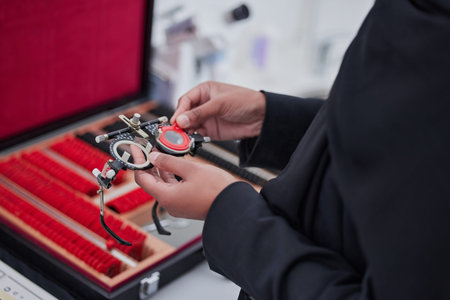 Glasses, lens and hands with ophthalmology tools, trial frame with woman, healthcare for eyes and...