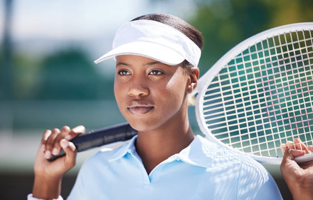 Thinking, tennis sports and black woman on court outdoors for match, game or competition. Training face, idea and serious athlete with racket for exercise, practice or workout for wellness or fitnessの写真素材