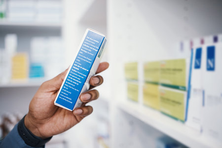 Pharmacy, medicine and pills, man and box in hand, healthcare and prescription medication in drug store. Medical, closeup and pharmaceutical product for health, wellness and treatment with pharmacistの写真素材