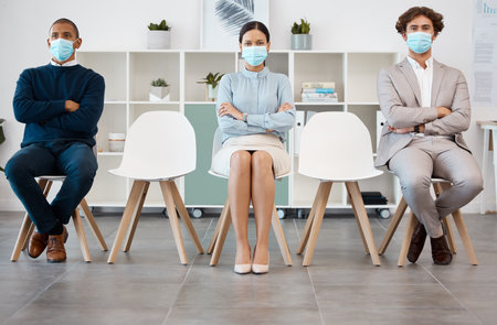 Covid regulations and recruitment chair row with responsible candidate group with social distancing. Interview, pandemic and hiring in corporate company with virus protocol for employee safety.の写真素材