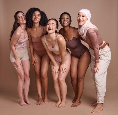 Diversity, women and beauty in studio for self love, global community and support, wellness and healthy skincare. Portrait, female and happy models, body positive group and inclusion with solidarityの写真素材