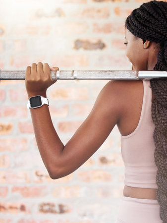 Back, black woman and lifting for exercise, workout and training for health, wellness and power....