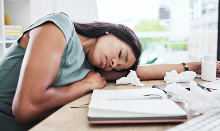 Woman, sick and sleeping on office desk in burnout suffering from stress, depression or mental...