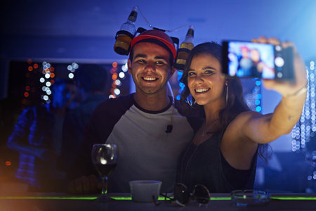 Friends, night club and smile for phone selfie, celebration or social event at the night party....