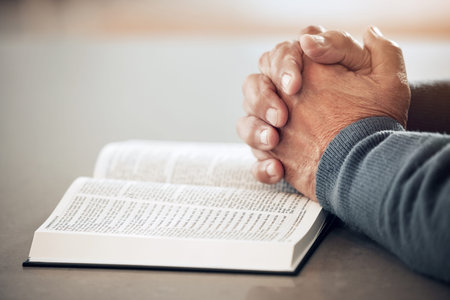 Bible, reading book or hands of man for prayer, support or hope in Christianity religion or holy...