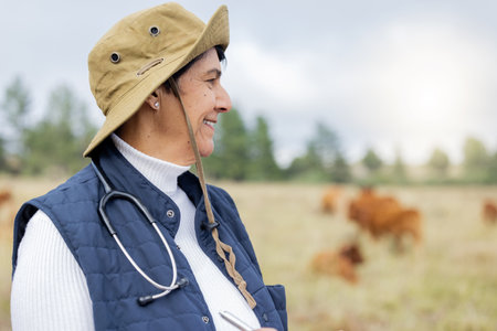 Farm, vet and mockup with a woman outdoor on a field for agriculture, sustainability or animal health. Doctor, veterinary and healthcare with a female medicine professional in the countrysideの写真素材