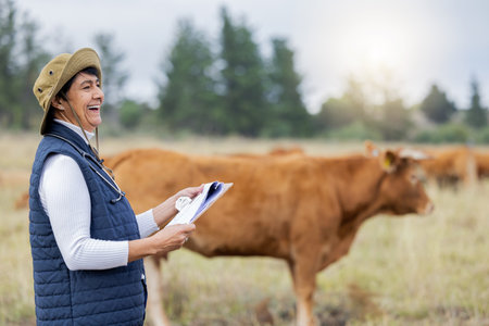 Farm, veterinary for cow and woman with clipboard for inspection, checklist and animal wellness. Agriculture, healthcare and happy senior vet working in countryside, cattle farming and livestockの写真素材