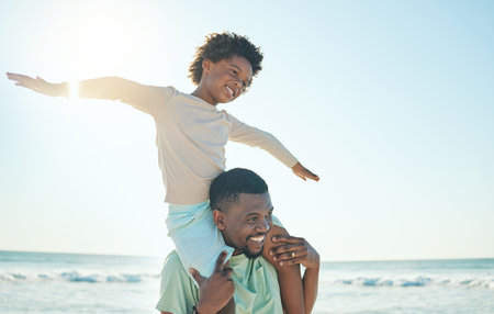 Happy father, excited child and beach fun with boy on dad shoulders with parent care or bonding. Outdoor, sea and summer holiday of black family on vacation with happiness and playing with sky mockupの写真素材
