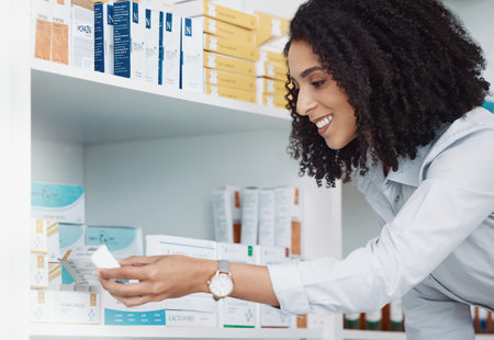 Pharmacy, medicine and product with woman reading side effects in store for healthcare, drugs dispensary and treatment prescription. Medical, pills and pharmacist check label information or shelfの写真素材