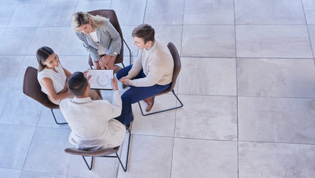 Planning meeting, portfolio documents or team communication, strategy or conversation about brand...