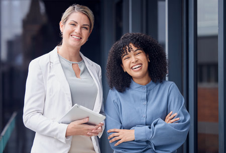 Collaboration diversity, arms crossed and portrait of women together for planning and solidarity. Happy, laughing and people in business with pride, confidence and expertise as a partnershipの写真素材