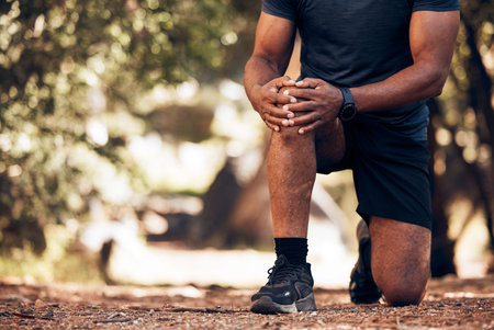 Senior hands, knee pain and injury in nature after accident, workout or training. Sports, athlete...