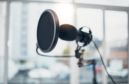 Microphone, audio and technology, podcast or radio with sound equipment closeup and broadcast media. Public relations, live streaming and production in studio with content creation and social networkの写真素材